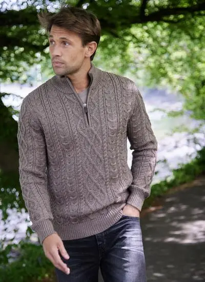 Man walking in woods wearing Half Zip Aran Sweater in Brown Marl