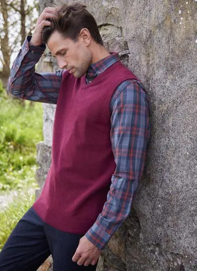 V neck lambswool slipover, short sleeved sweater vest in pochard (red), side