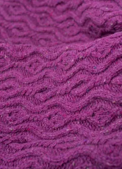 berry colored wool cashmere aran throw with flecks of color throughout