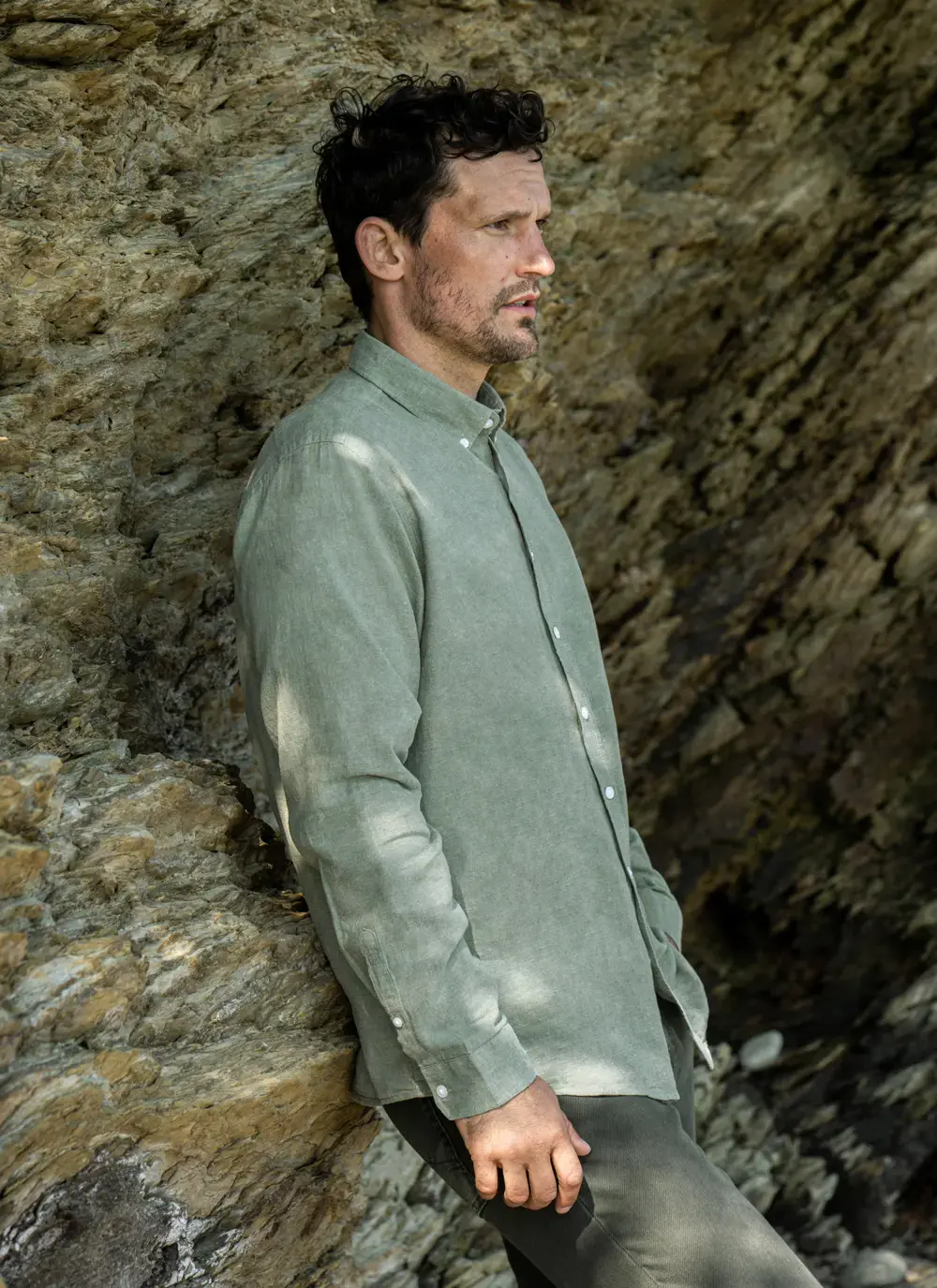 Side profile of model in green Finn Cotton Linen Shirt – lightweight fabric ideal for warm weather layering.