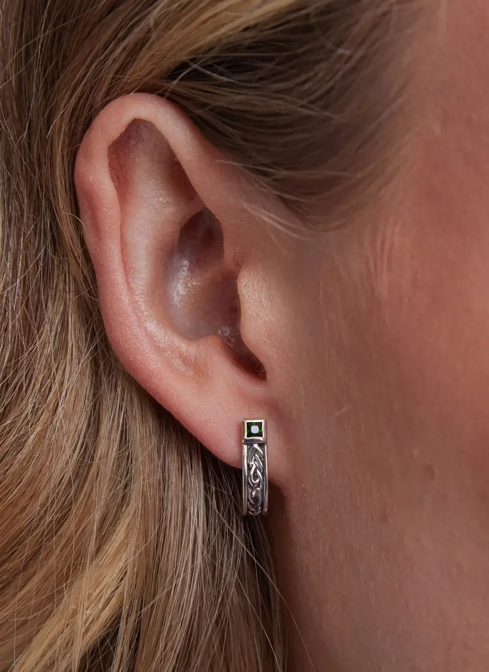 Celtic Huggie Earrings with Green Cubic Zirconia