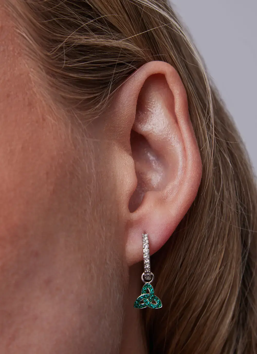 Sterling Silver Trinity Knot Drop Earrings With Sparkling Green Crystals and Clear Crystal Rings
