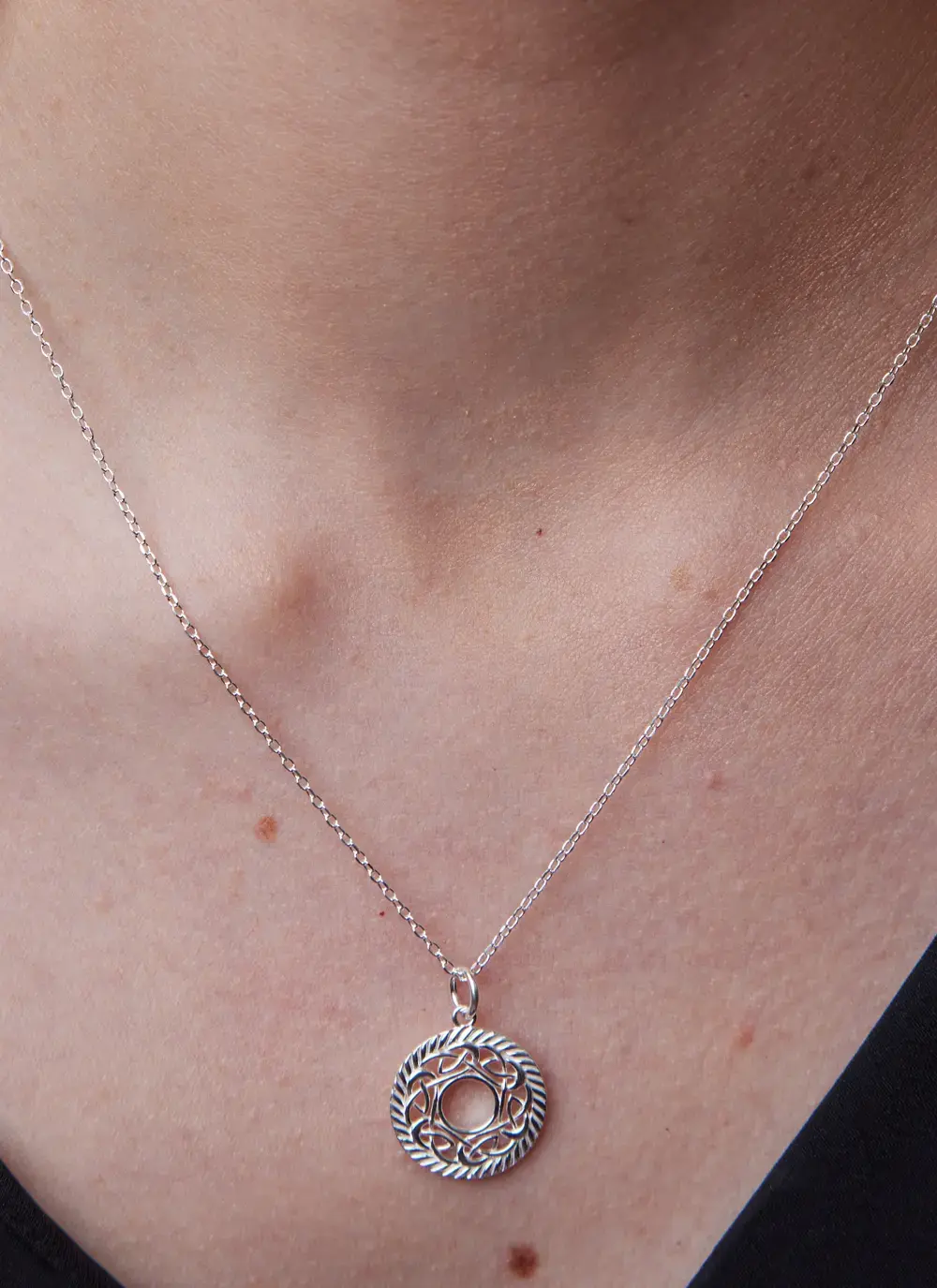 Sterling Silver Celtic Pendant With Intricate Knotwork Patterns Braided Circular Border