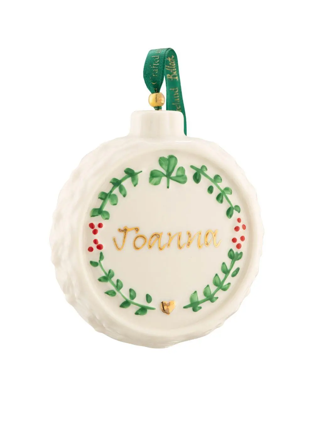 A personalized christmas ornament featuring a white circular design with green leafy wreath and the name 