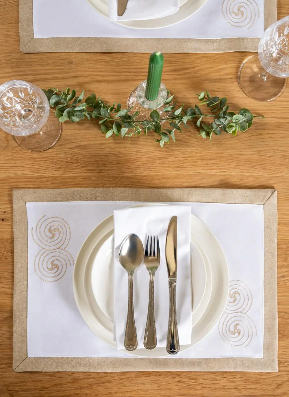 styled placemat on table with decorations top down 