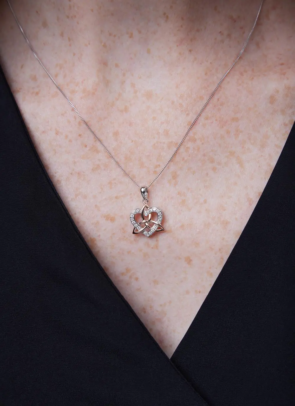 Décolletage shot of Celtic Trinity 