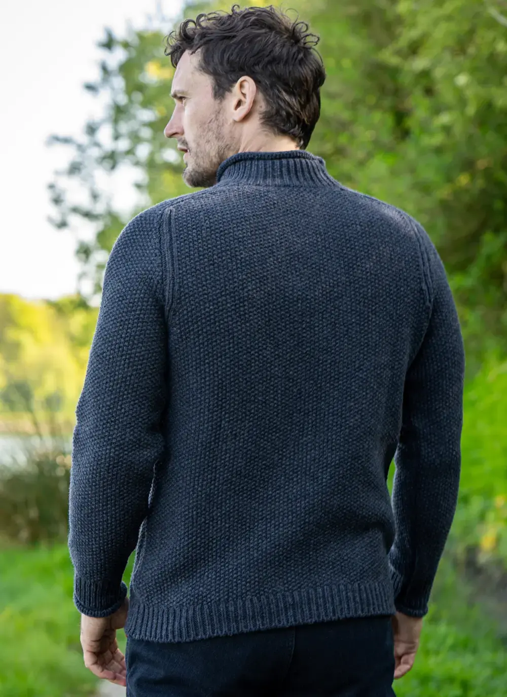 Back view of the Fisherman out of Ireland sweater in dark indigo