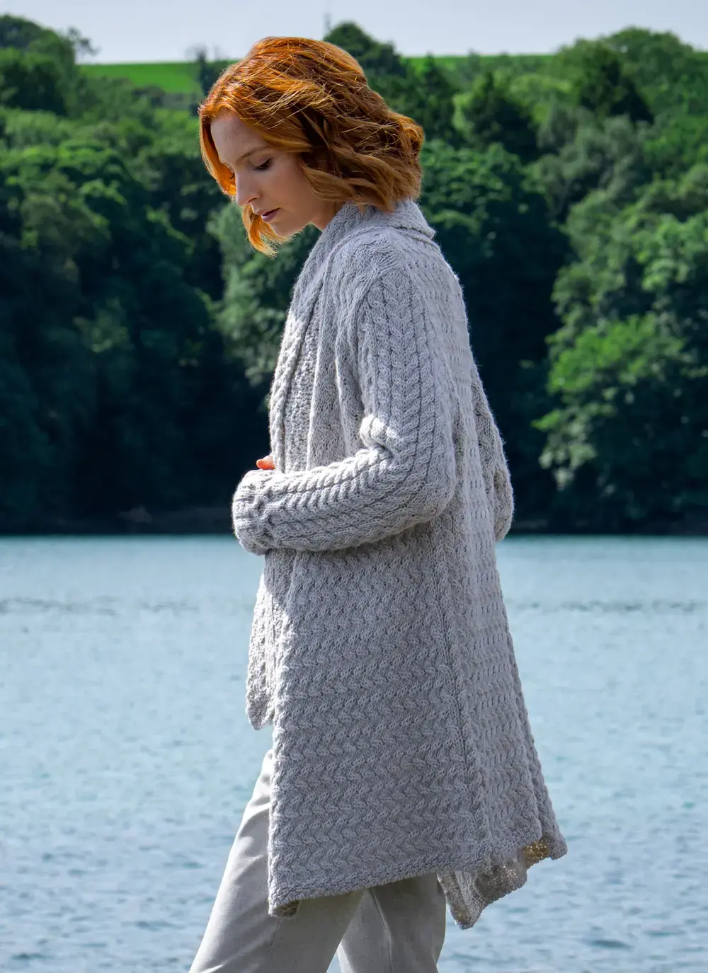 Side view in motion Glenross Aran Waterfall Cardigan in Silver Marl 