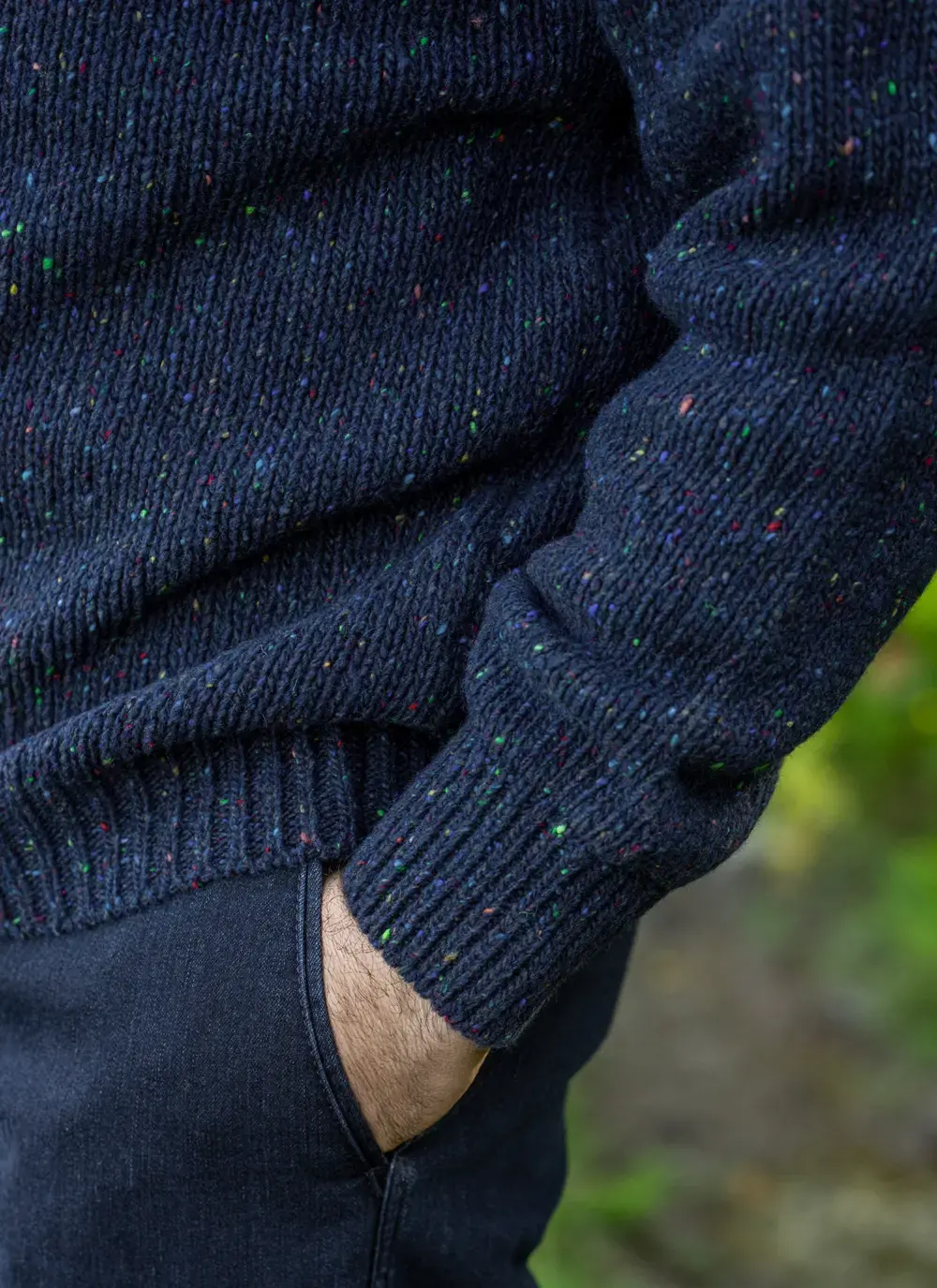 Man wearing navy Glenstone Contrast half zip sweater walking on nature path