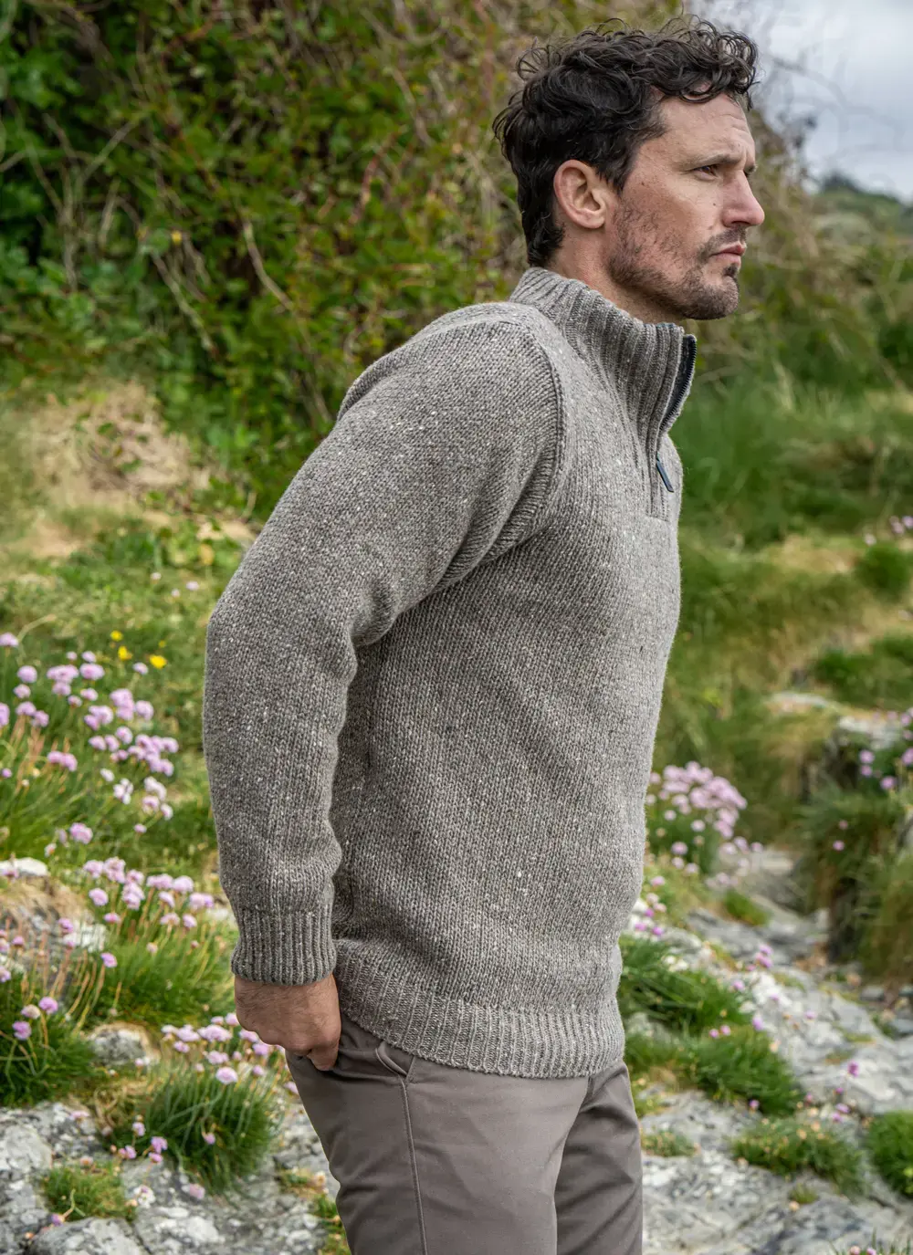 Side profile of model wearing Glenstone 1/2 Zip Sweater in Rocky Ground, highlighting ribbed cuffs and mock neck collar.