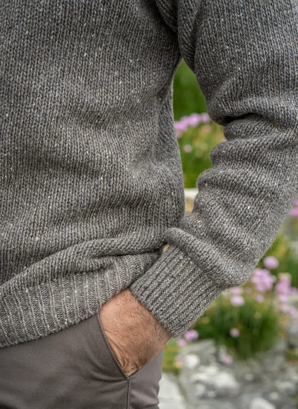 Close-up of sleeve, hem, and pocket on Glenstone Sweater in Rocky Ground, focusing on knit detail and soft finish.