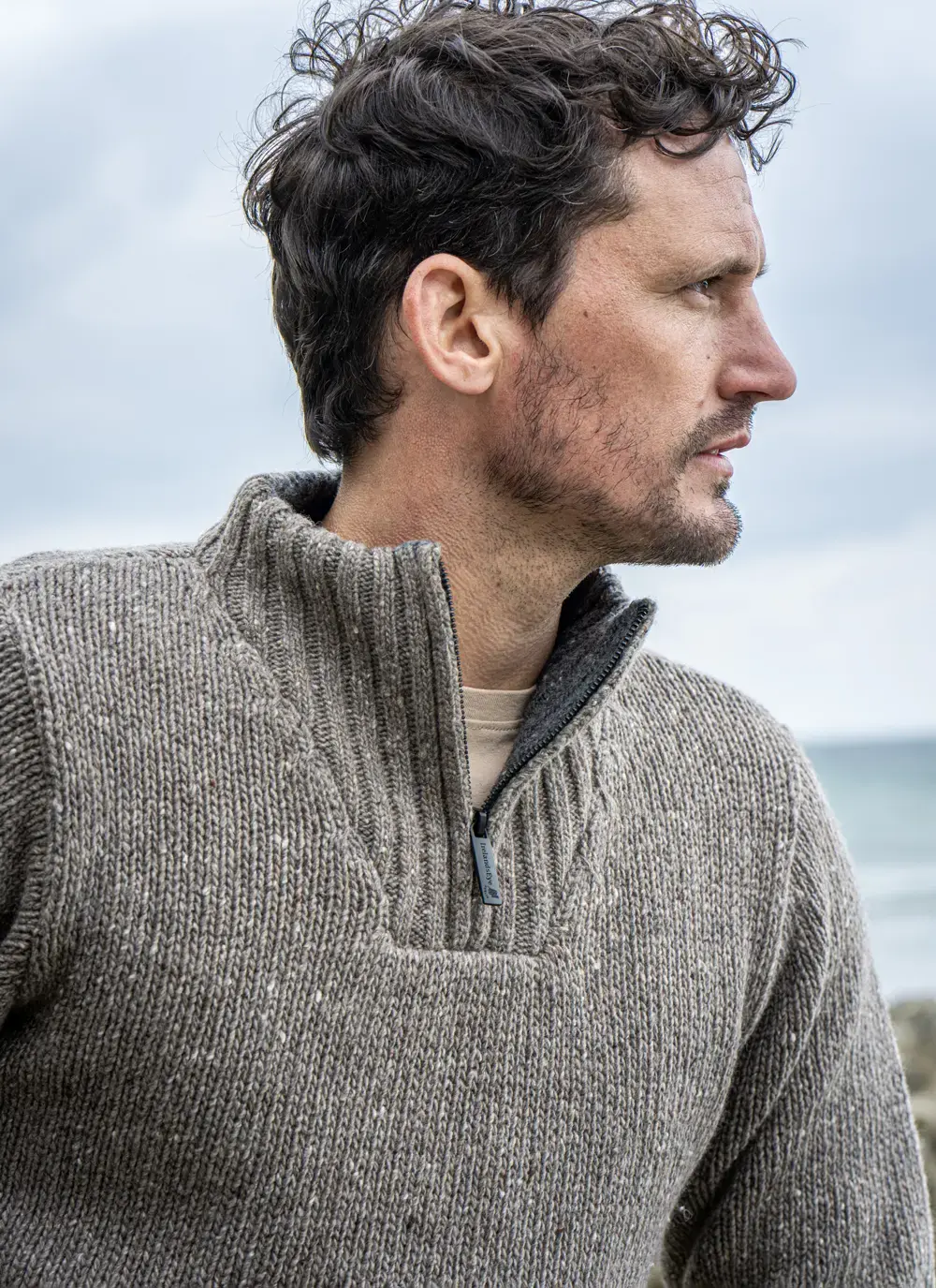 Close-up of Glenstone Contrast 1/2 Zip Sweater in Rocky Ground, highlighting textured knit pattern and zip collar with soft fleece lining.