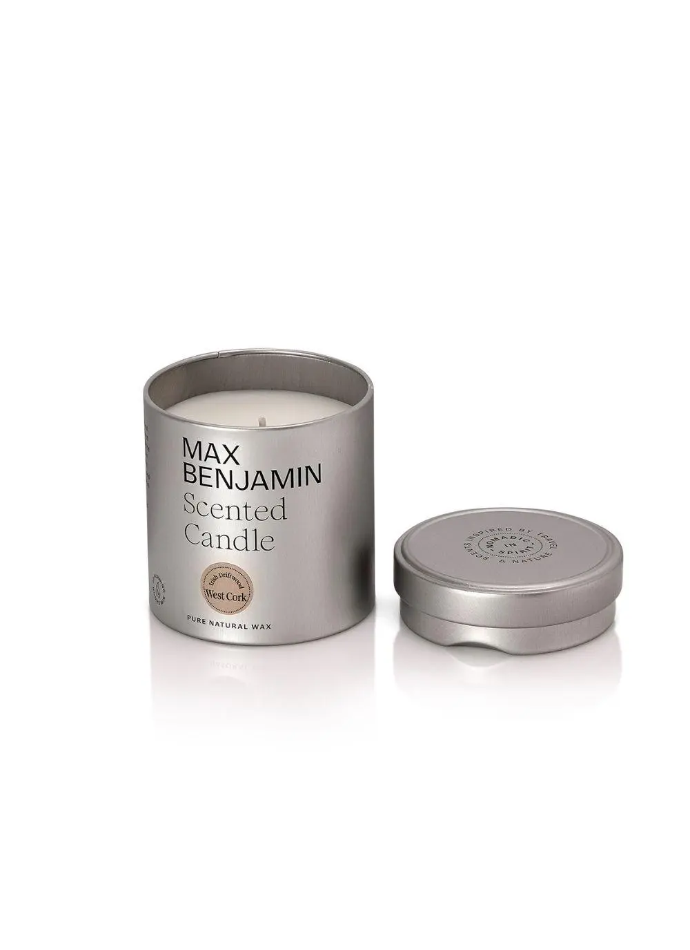 candle in packaging tin with label 
