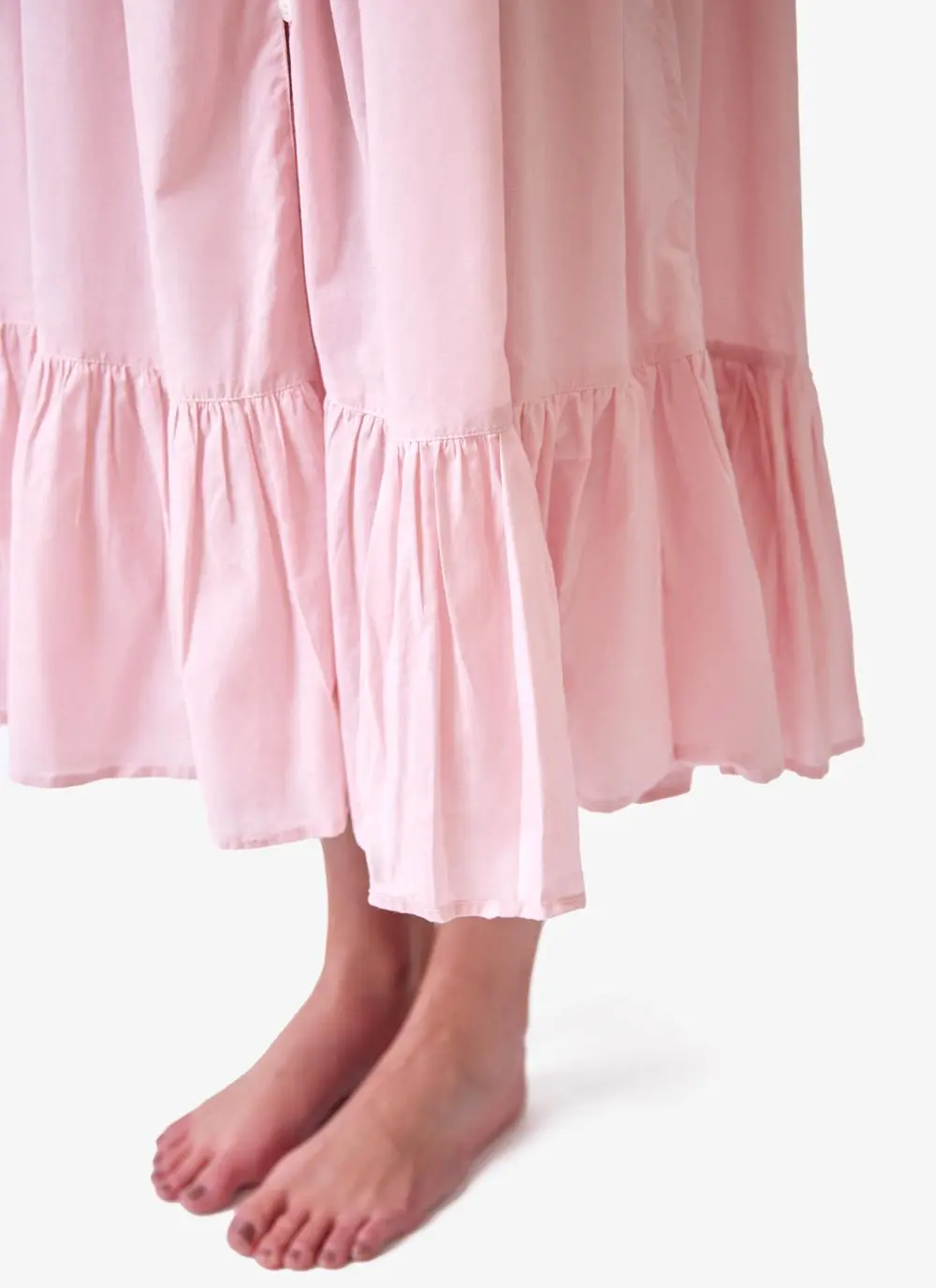 Red haired model wearing pink cotton nightdress