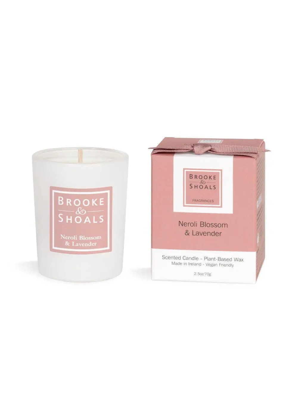 candle and packaging on white background