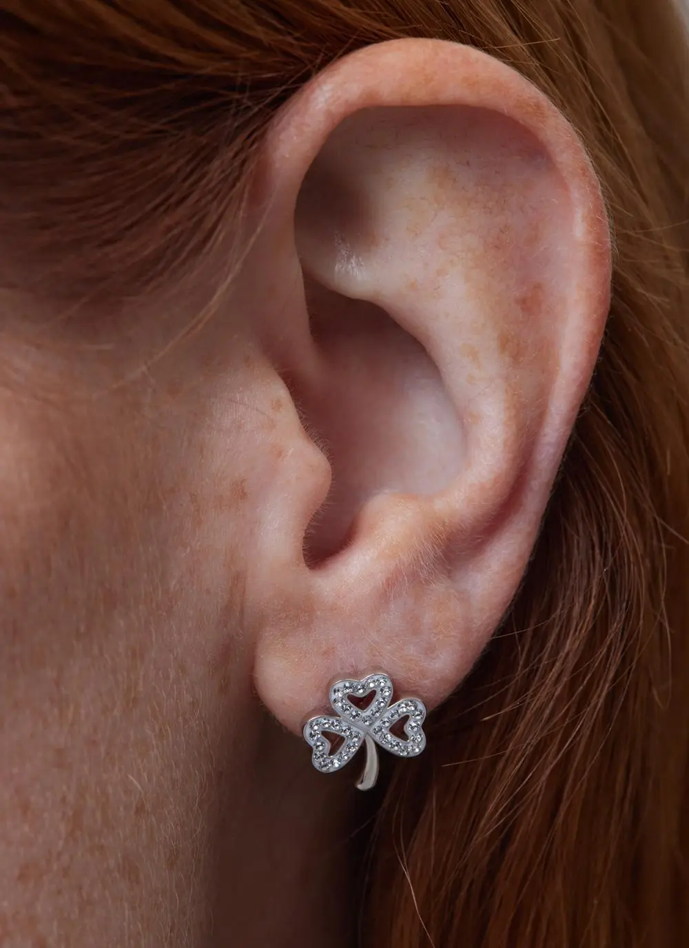 Close up shot of Shamrock Stud Earrings Adorned With Swarovski Crystals