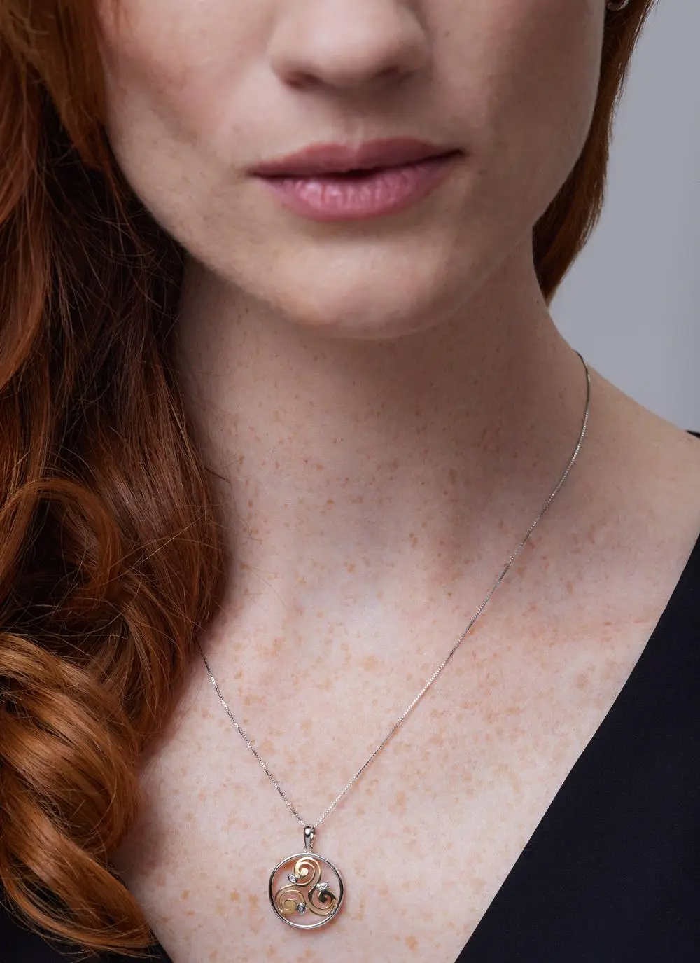 Close up shot of red haired model wearing Sterling Silver 