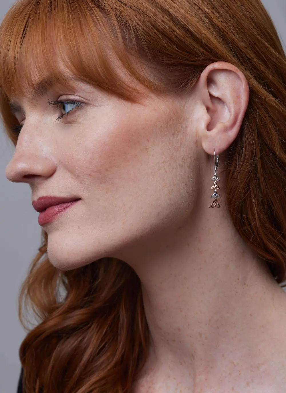 Red haired model wearing Sterling Silver 