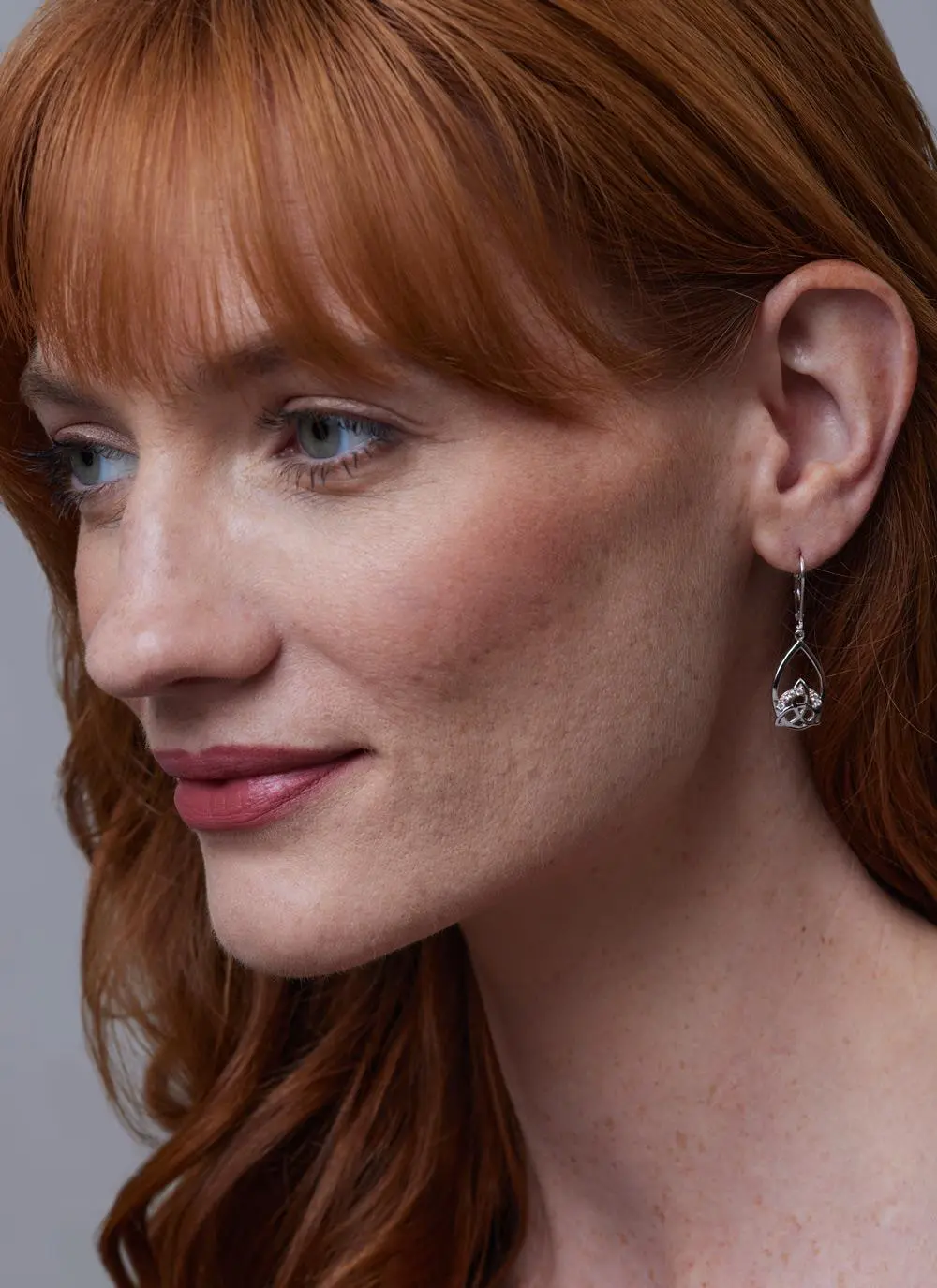 Red haired model wearing Sterling Silver 