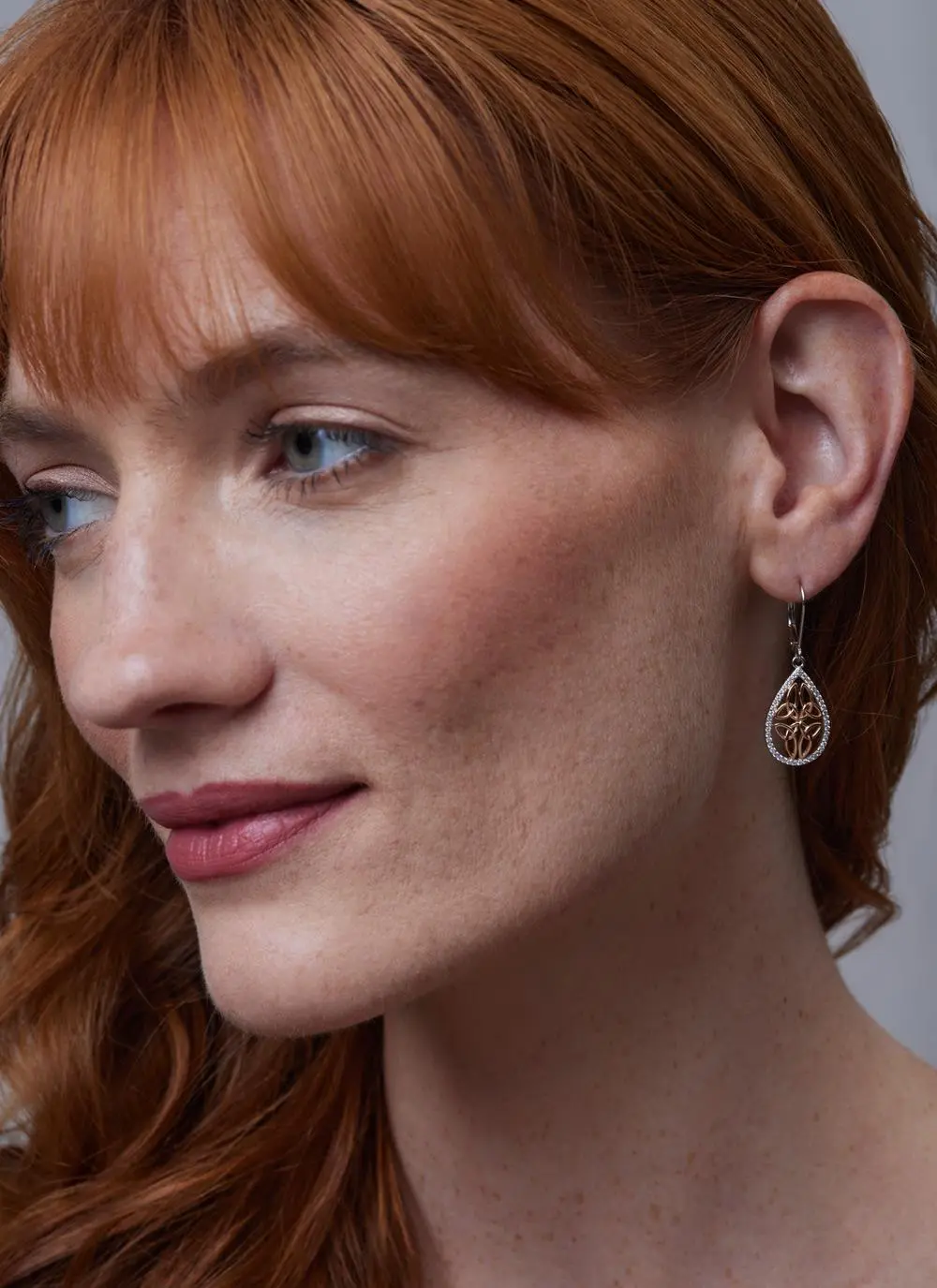 Red haired model wearing Sterling Silver 