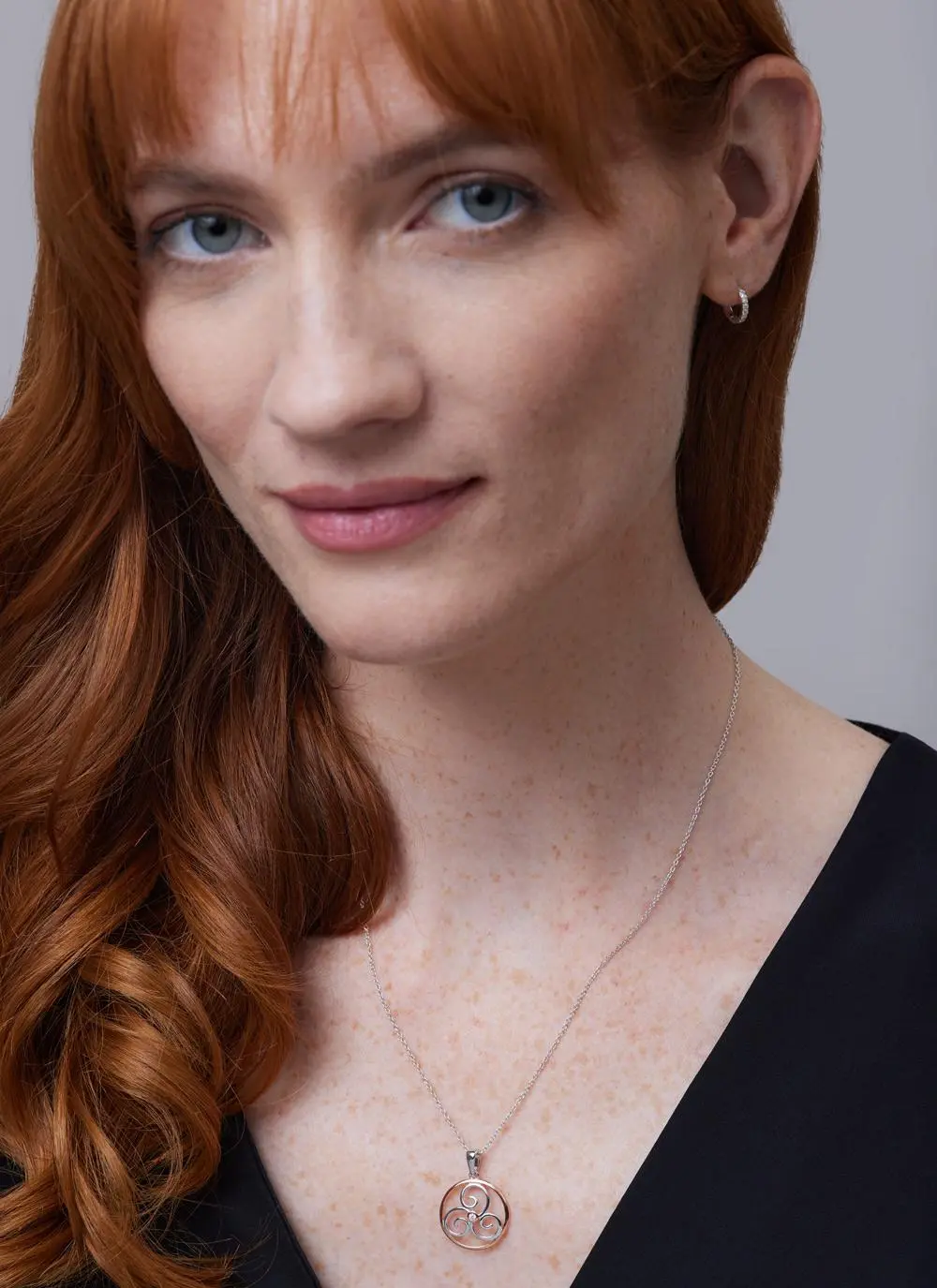 Red haired model wearing Sterling Silver 