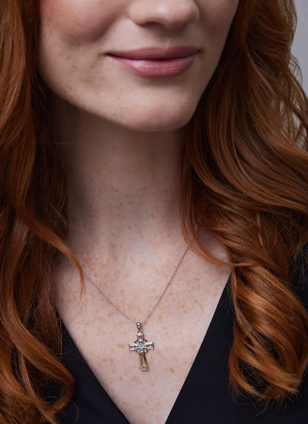 Close up of red haired model wearing Sterling Silver Celtic Trinity Diamond 