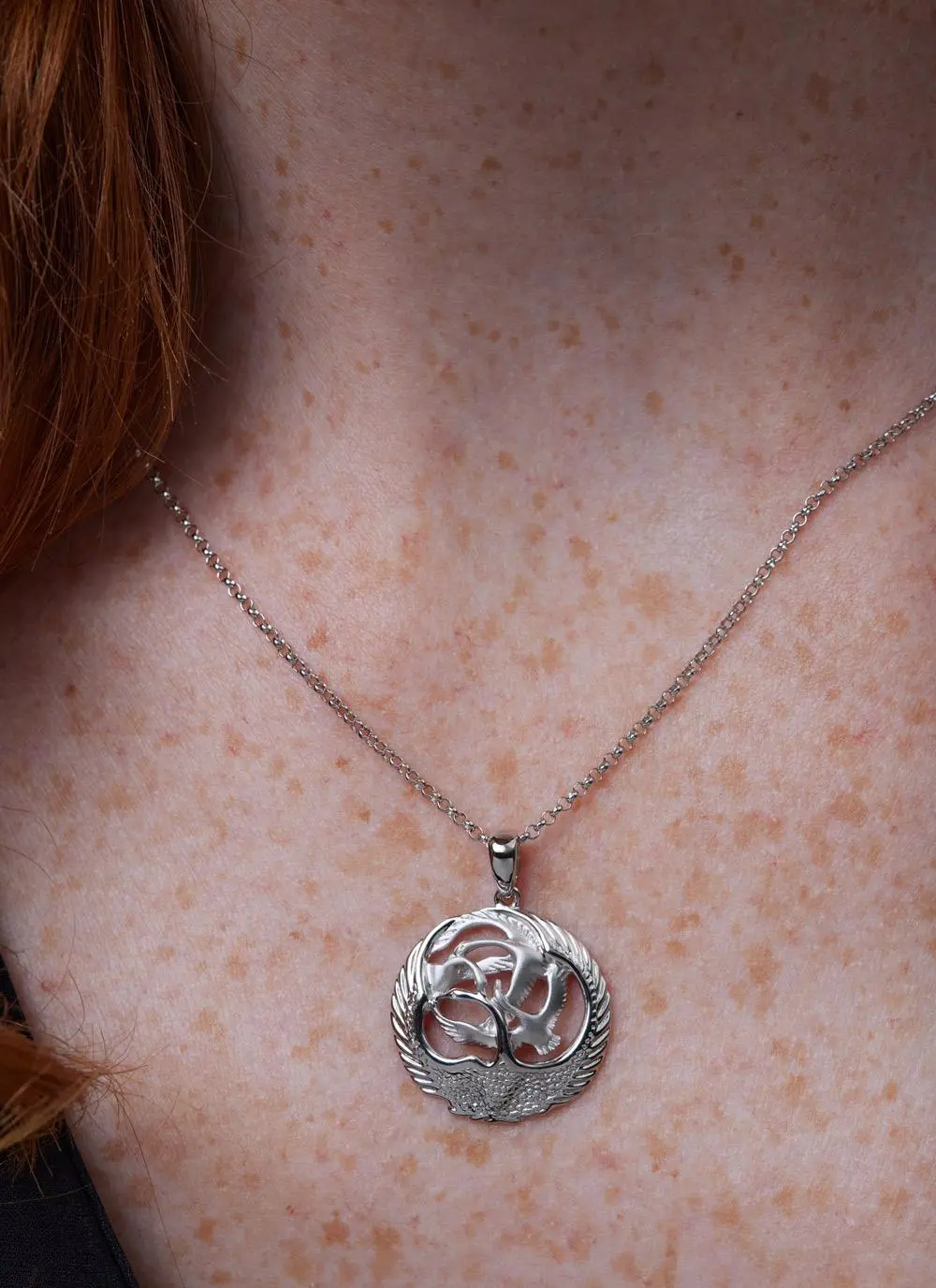 Décolletage shot of Sterling Silver Children Of Lir Pendant 