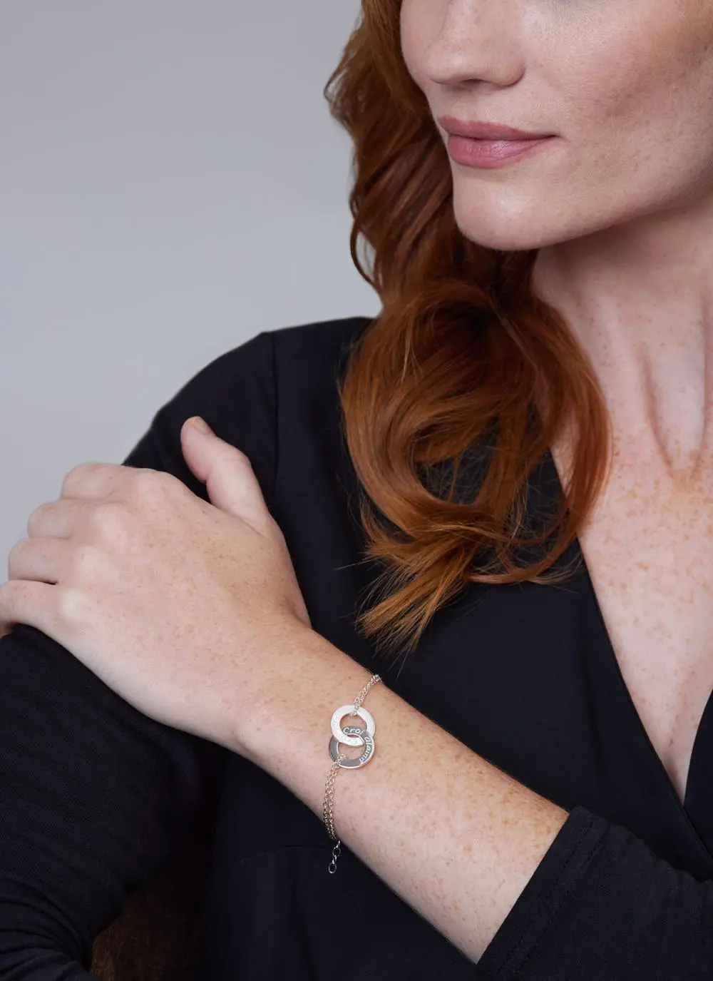 Red haired model wearing Sterling Silver Croi Alainn Double Bracelet  
