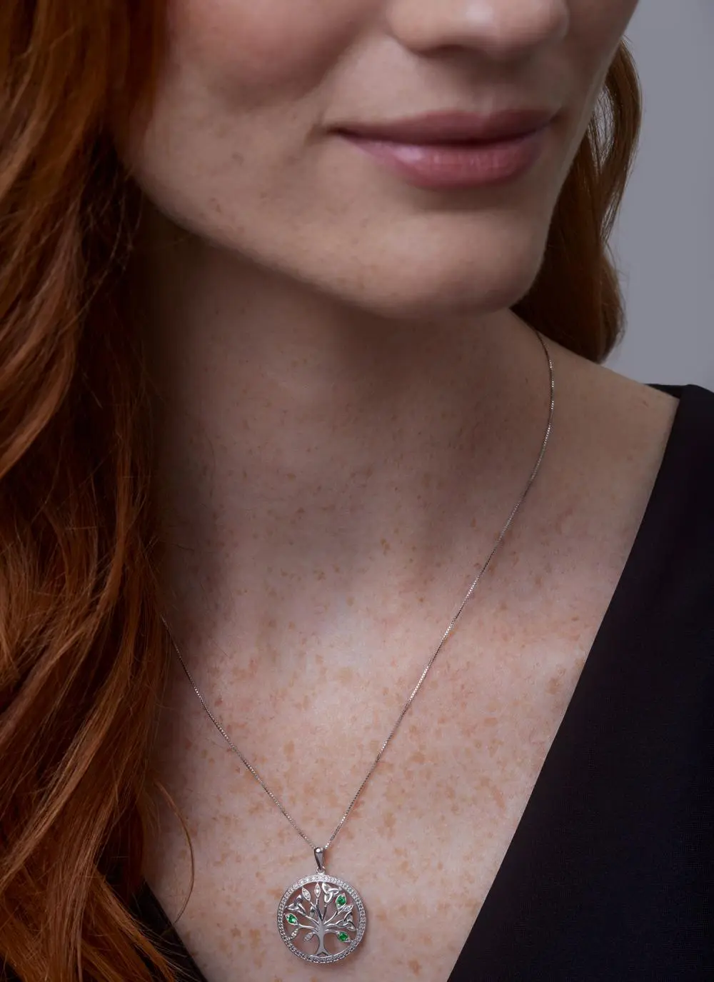 Close up shot of red haired model wearing Sterling Silver Crystal Illusion Tree of Life Pendant