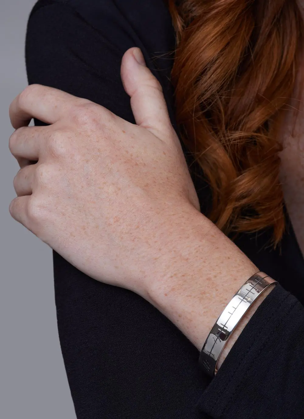 Close up shot of Sterling Silver Ogham Love Forever Bangle
