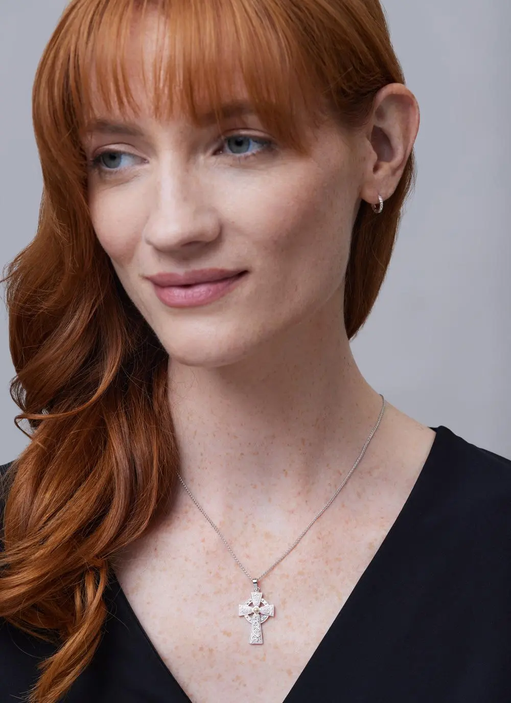 Red haired model wearing Sterling Silver Warrior Shield Cross