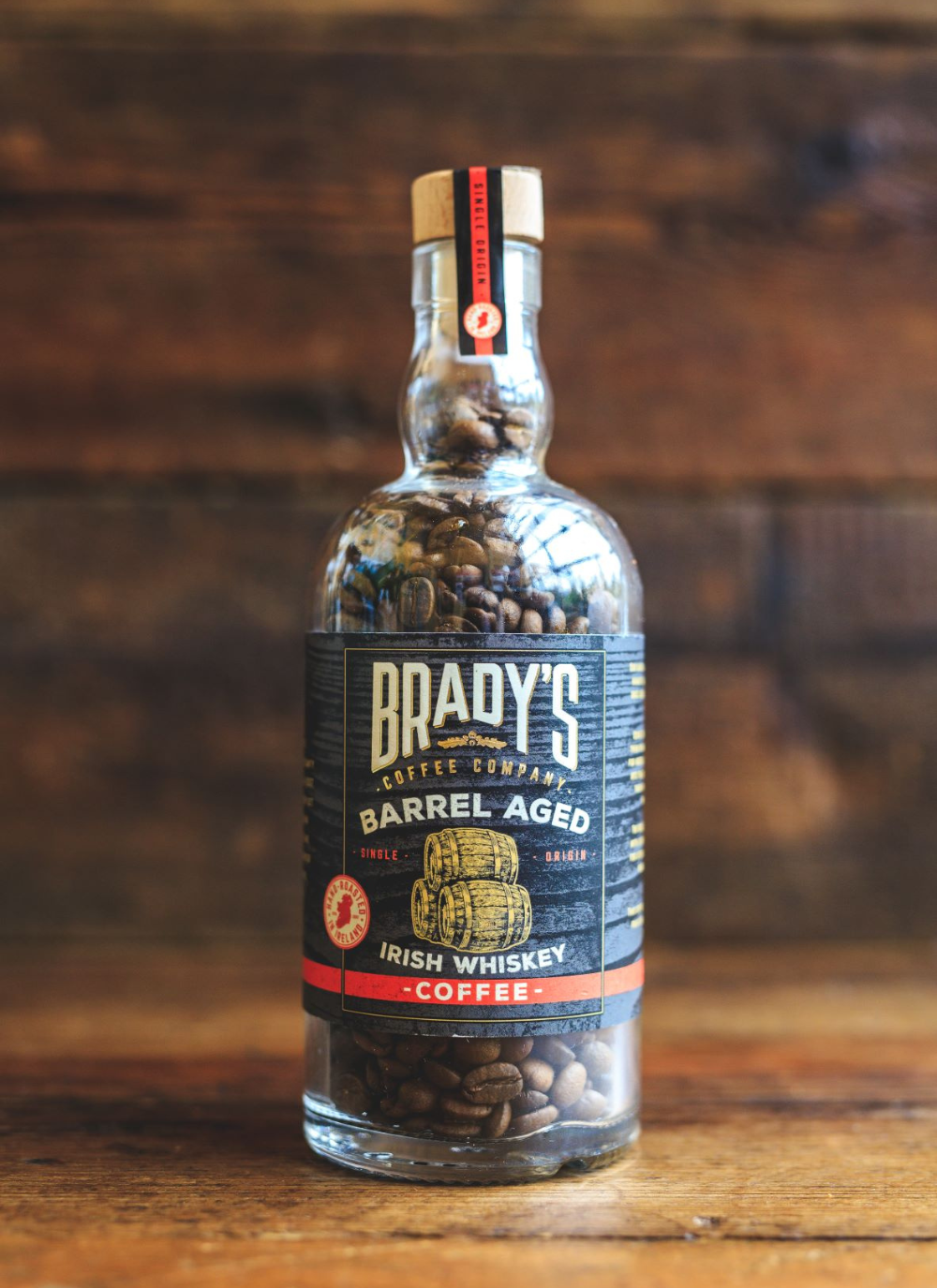 Bradys whiskey whole bean coffee in whiskey shaped tin