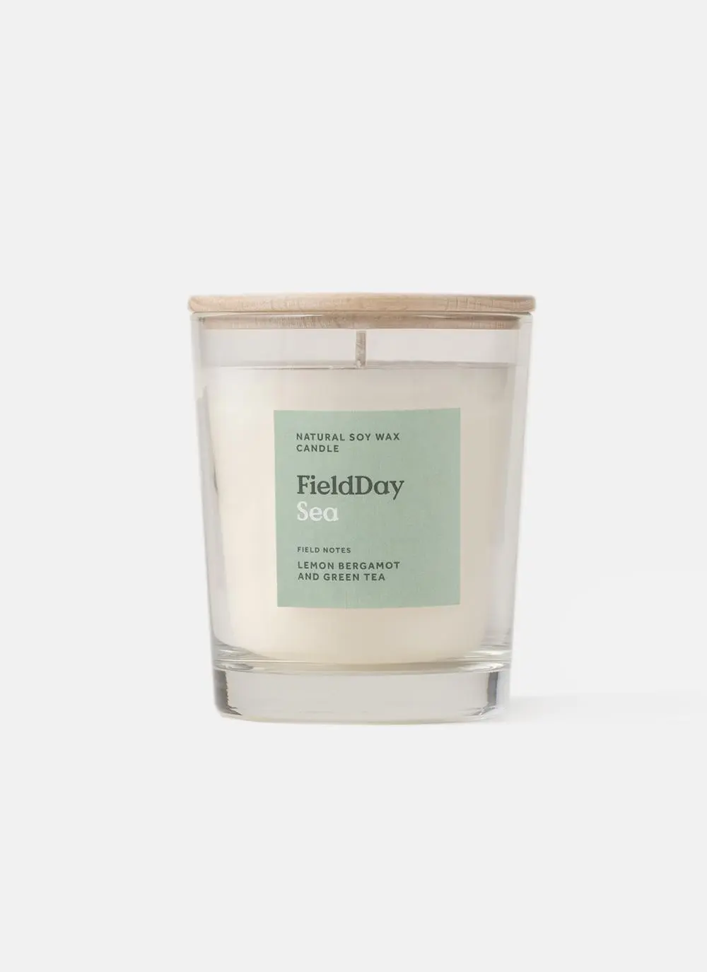 Candle on white background with label