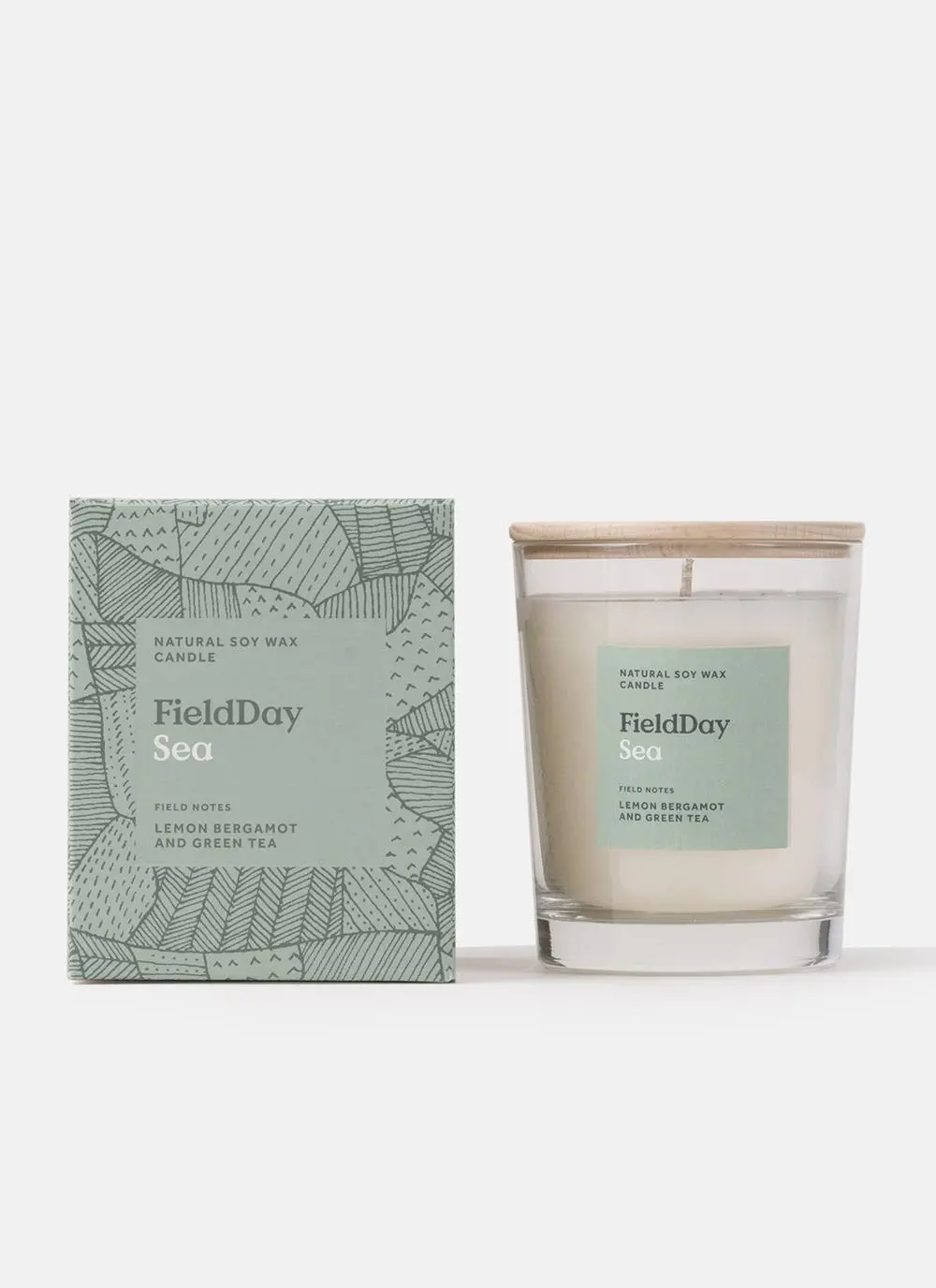 Candle on white background with packaging