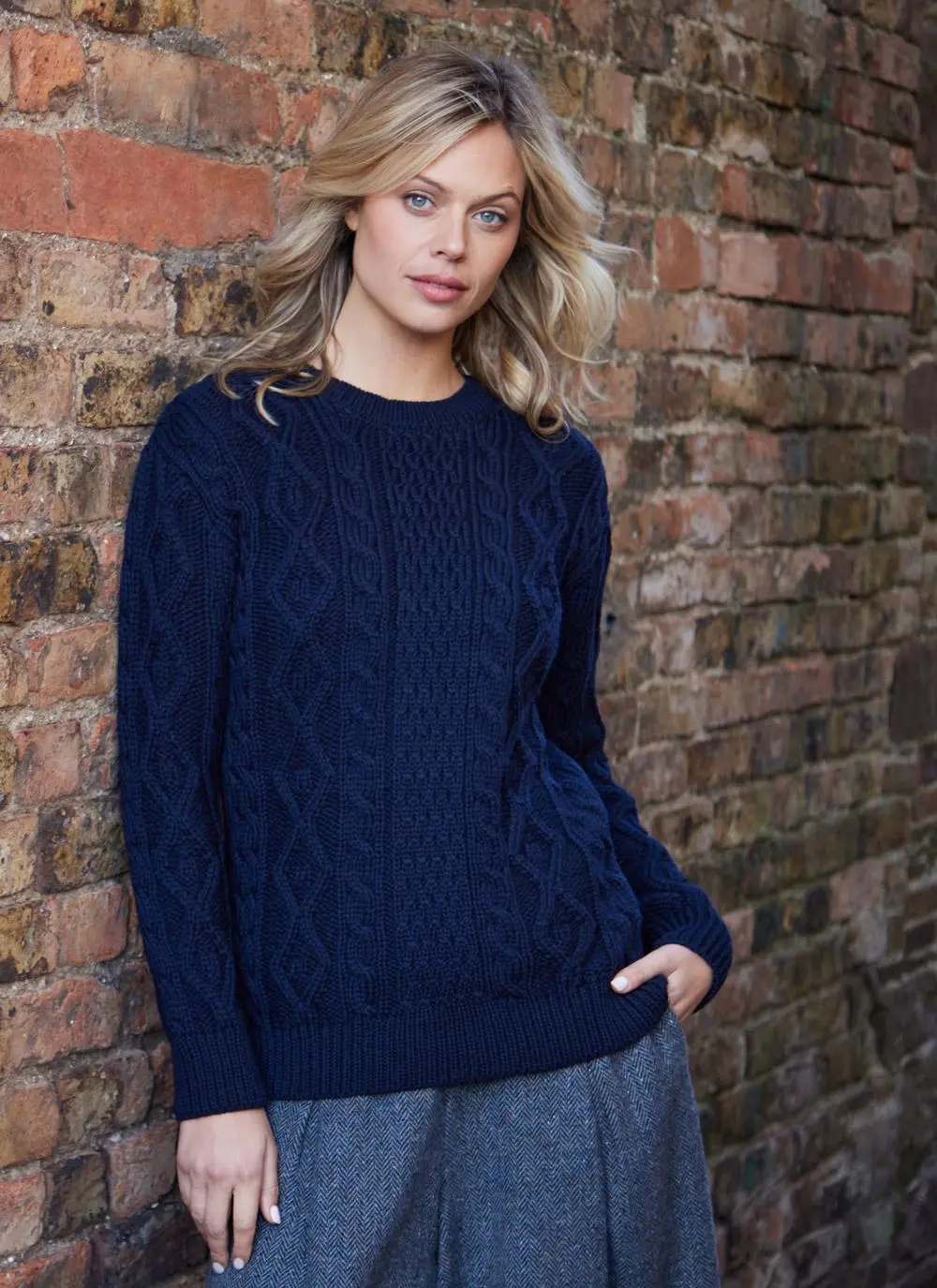 Dark navy ladies aran sweater on blonde model 