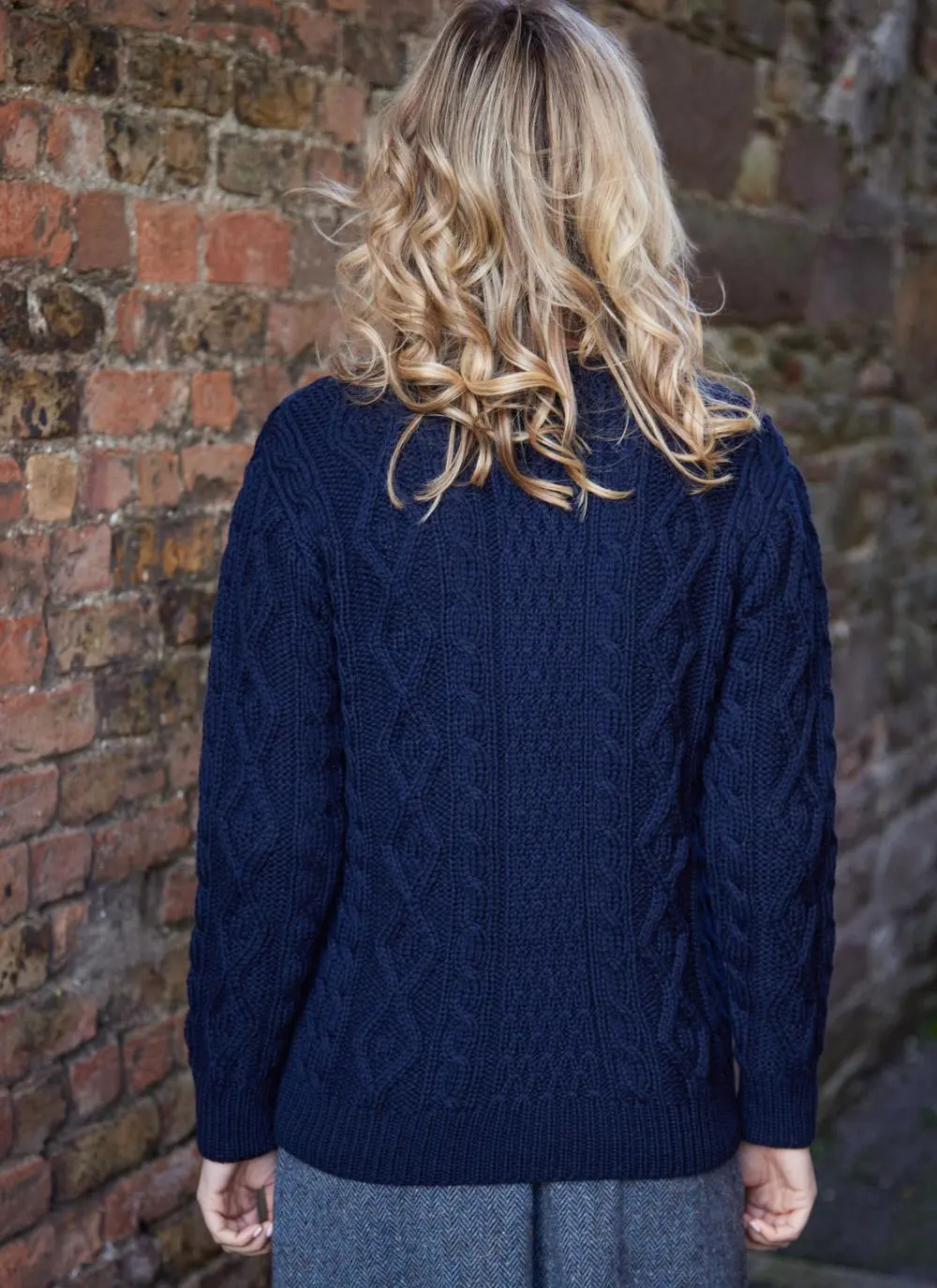 Dark navy ladies aran sweater on blonde model 
