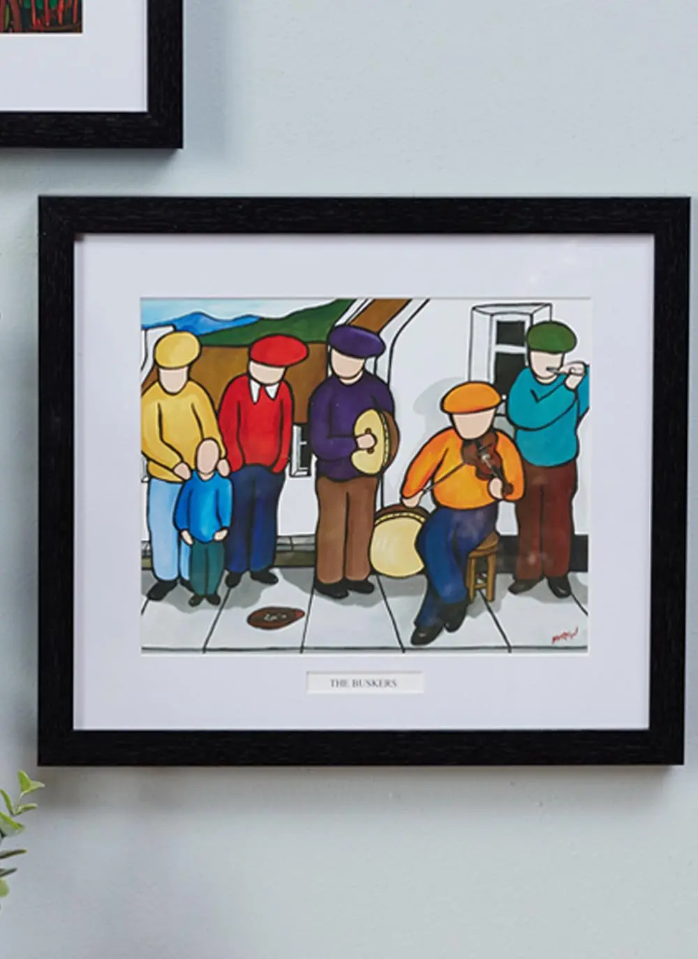 The Buskers Framed Print