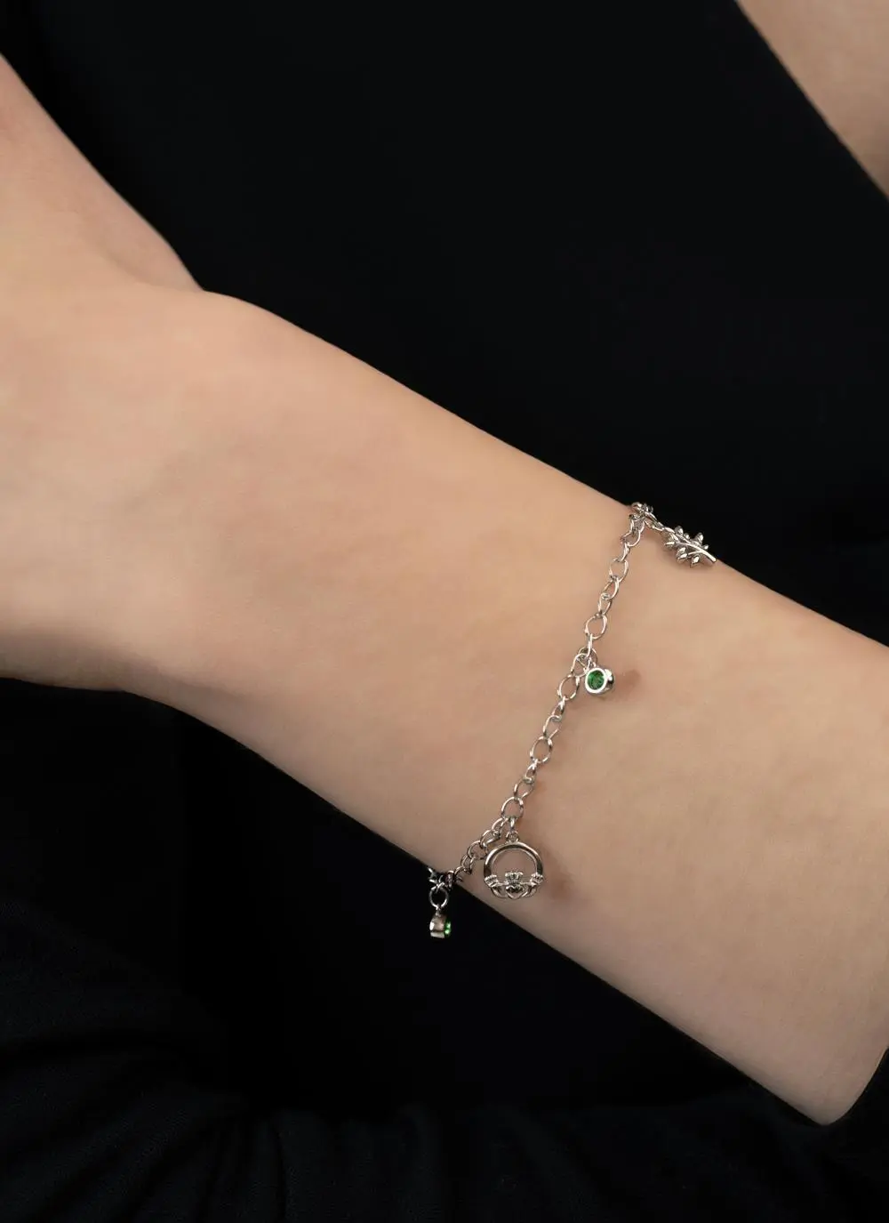 Sterling Silver Celtic Charm Bracelet with Green Cubic Zirconia