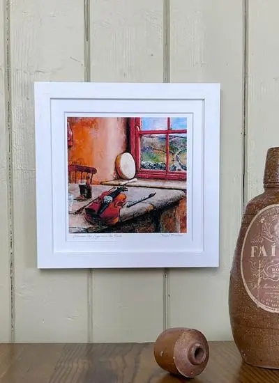 framed print of painting featuring irish traditional musical instruments