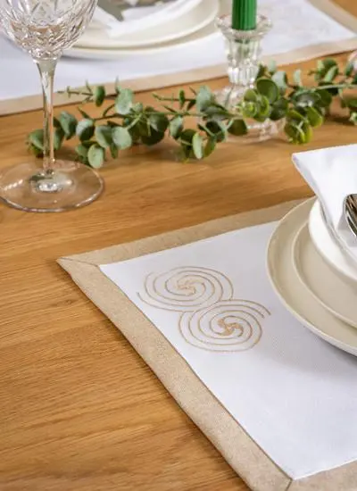 styled placemat on table with decorations in detail