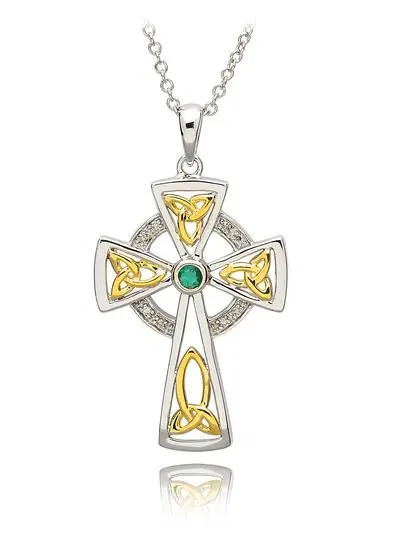White background cut out shot of Silver Celtic Trinity Diamond And Emerald Cross Pendant