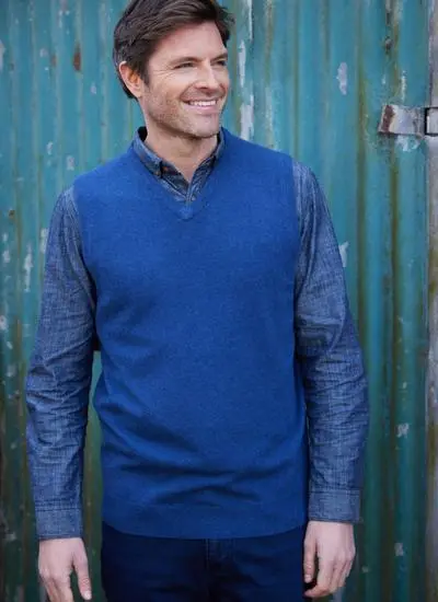 man wearing blue lightweight lambswool slipover